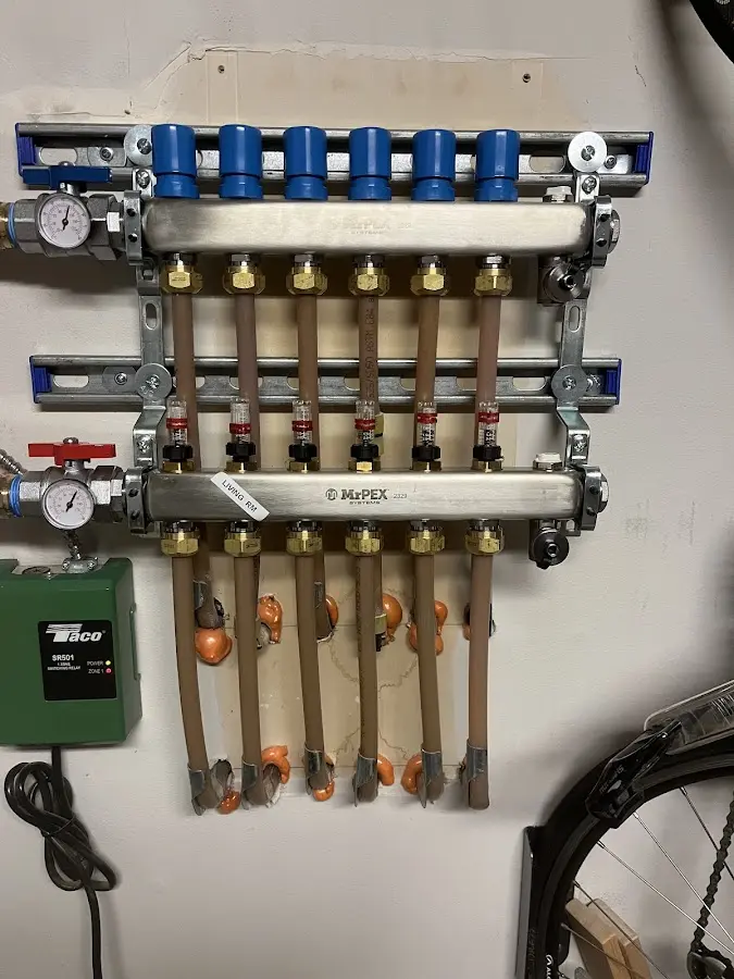 Plumber performing Water Heater Repair at a residential property in Benson